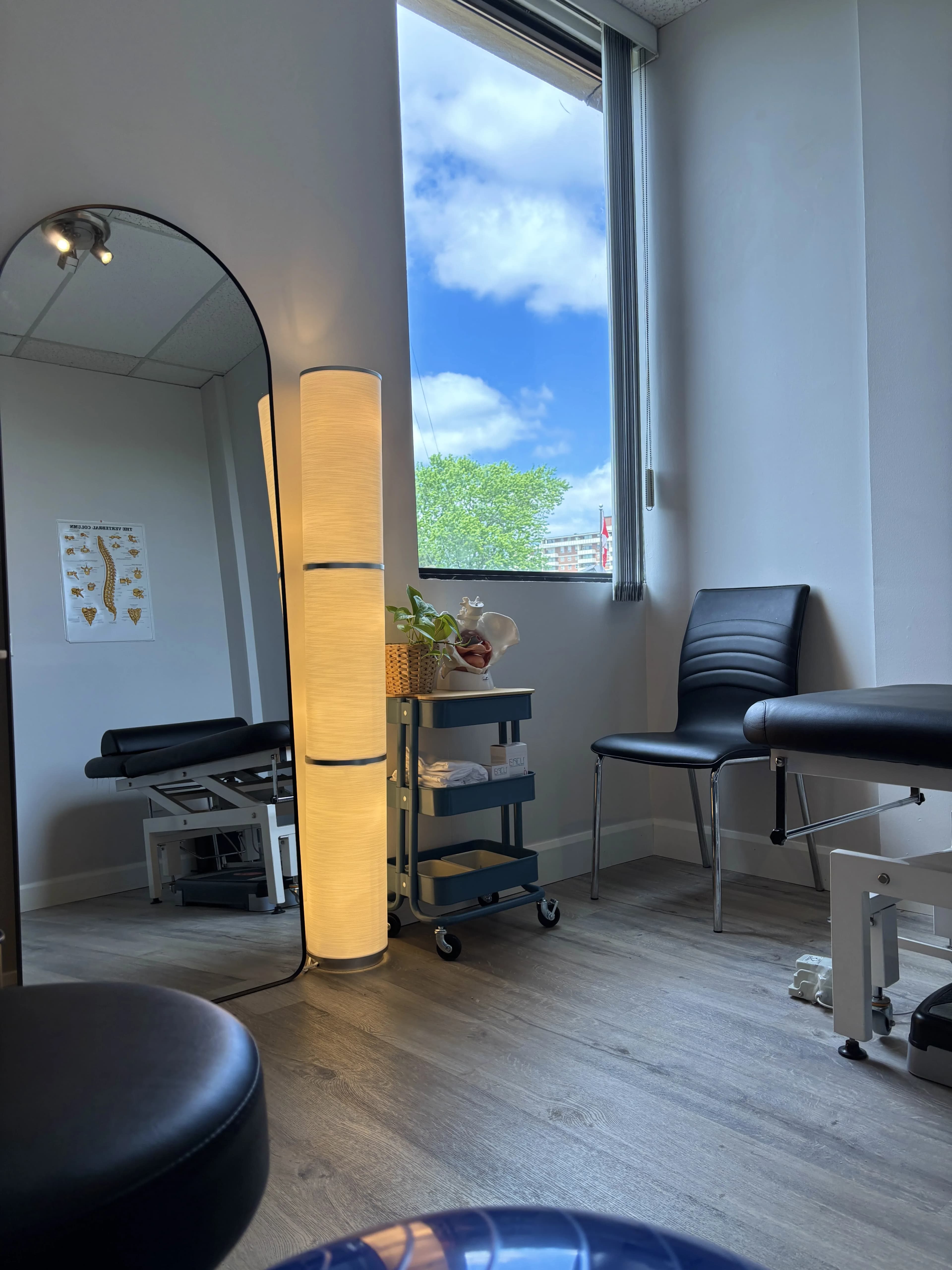 Treatment room with a window at Altitude Physiotherapy